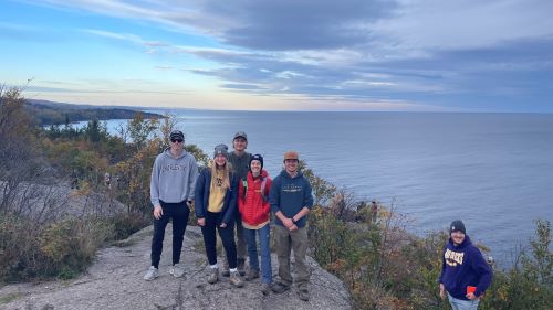 Minnesota State University, Mankato Geomorphology students posing on the North Shore of Lake Superior during a high-impact learning, research, and exploration field trip