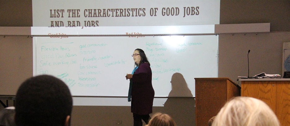 Criminal justice students in the classroom during a lecture on the list of characteristics of good jobs and bad jobs